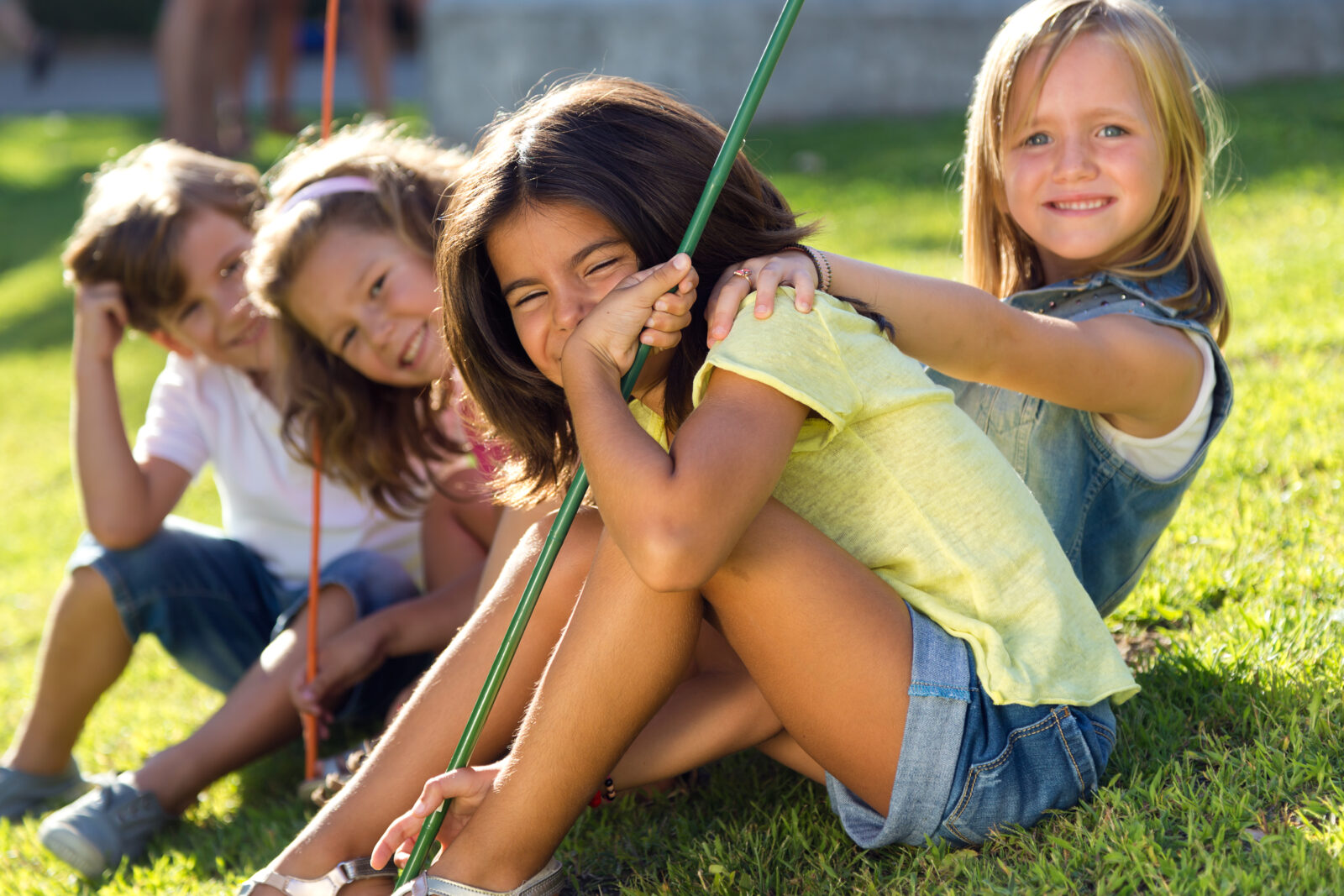 Group of childrens having fun in the park.